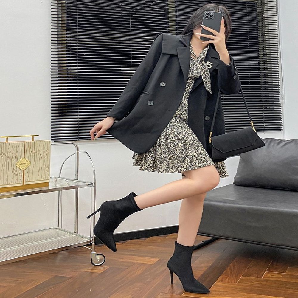 Red-soled high ankle boots