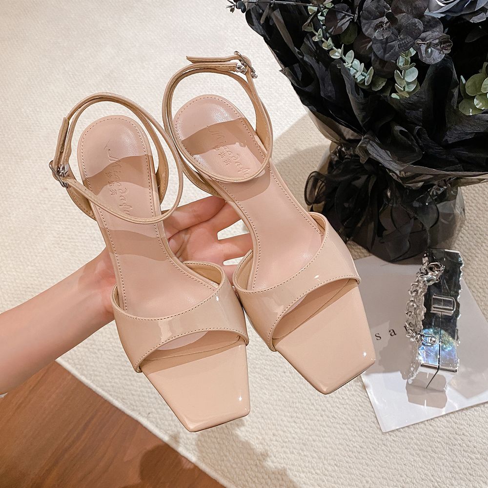 Open-Toe Stiletto Sandals with an Ankle Strap.