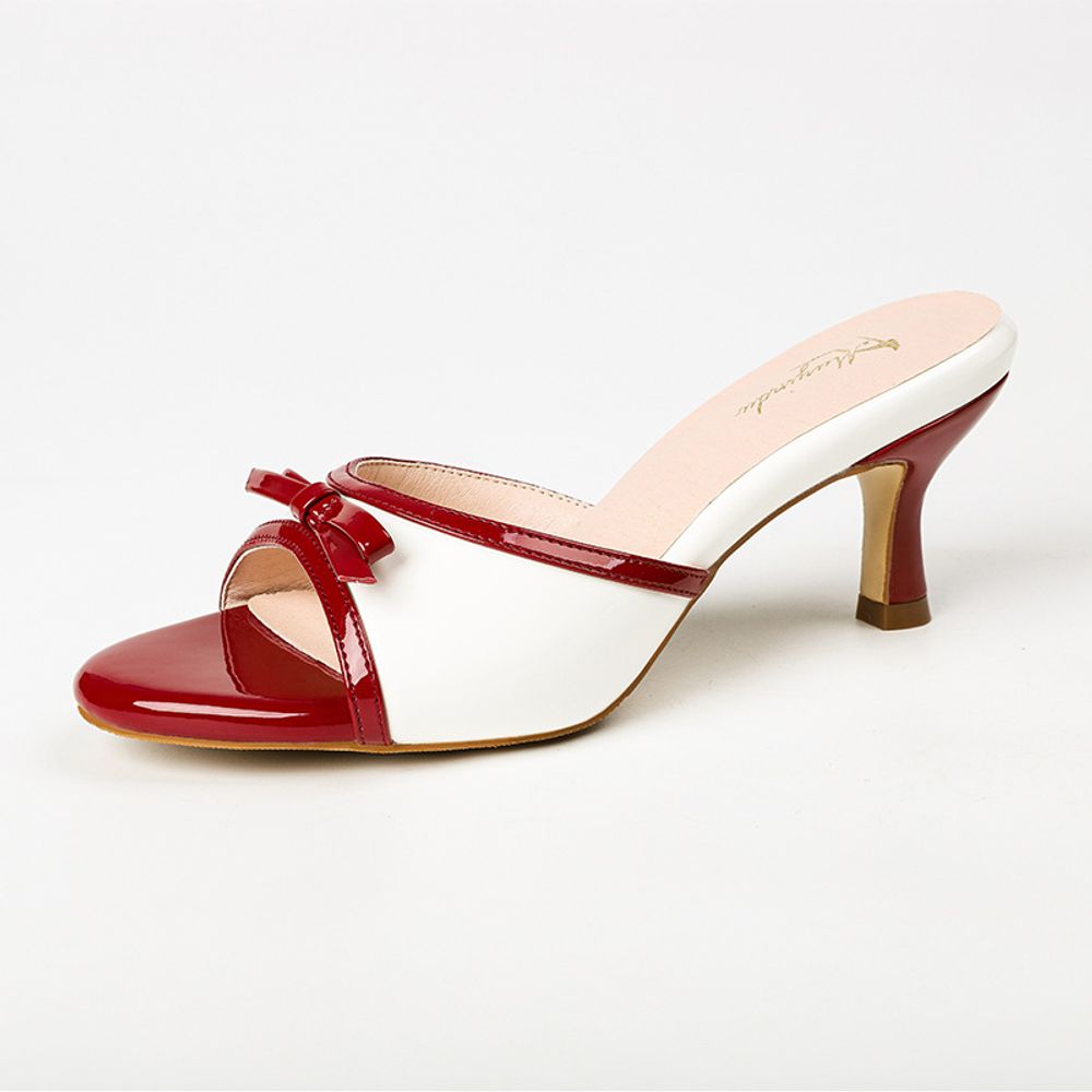 Two-tone open-toe kitten heel mule with a bow